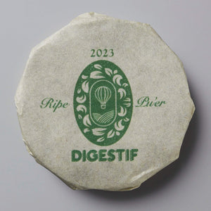 2023 DIGESTIF shou puer tea cake with green traditional hot air balloon design on white wrapper