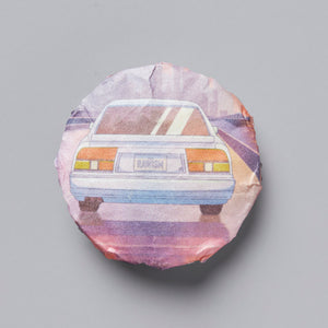 RAWISM 2020 sheng puer tea cake with watercolor illustration of vintage car rear view on pink wrapper
