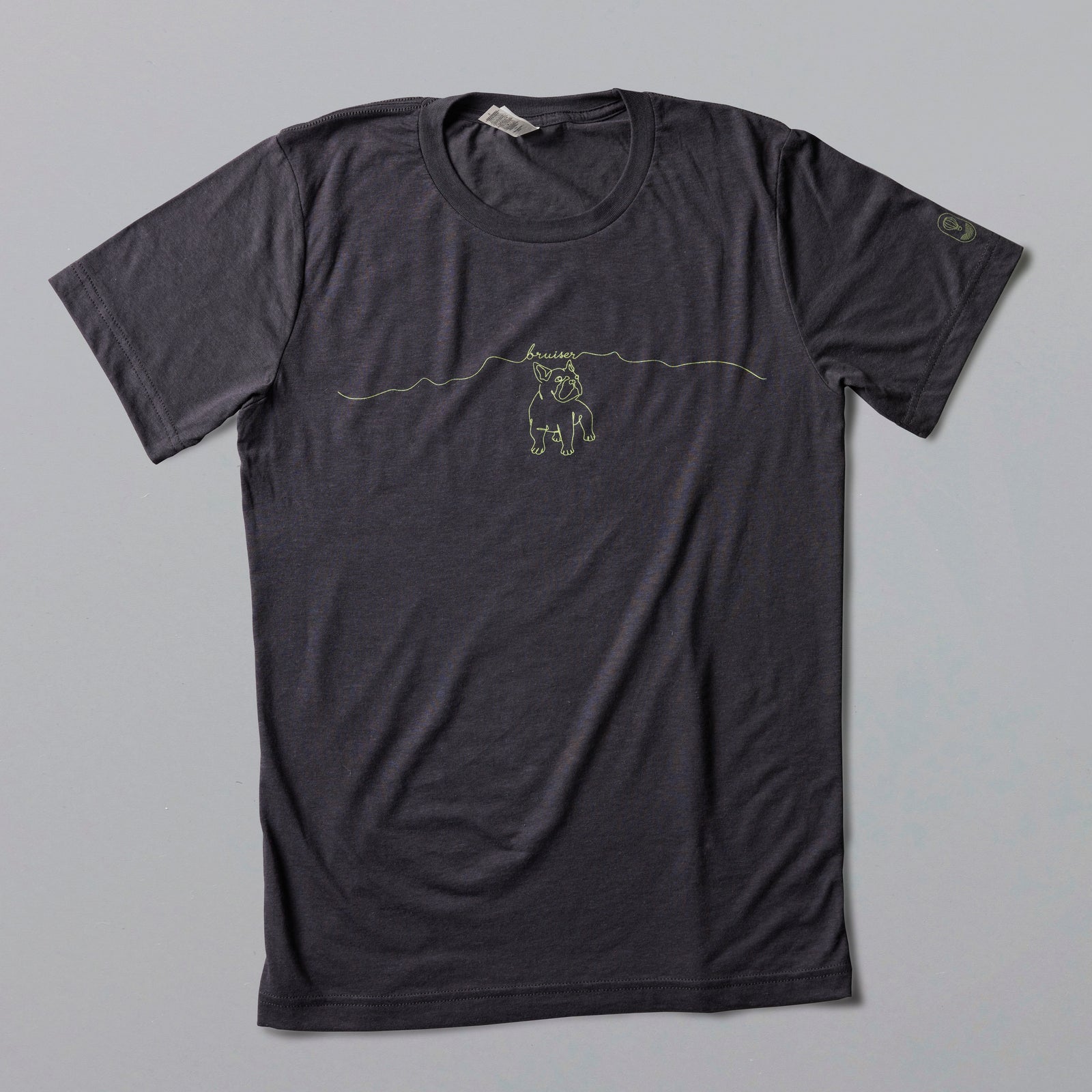 Bruiser Tee matte black t-shirt with minimalist green dog line art design on front